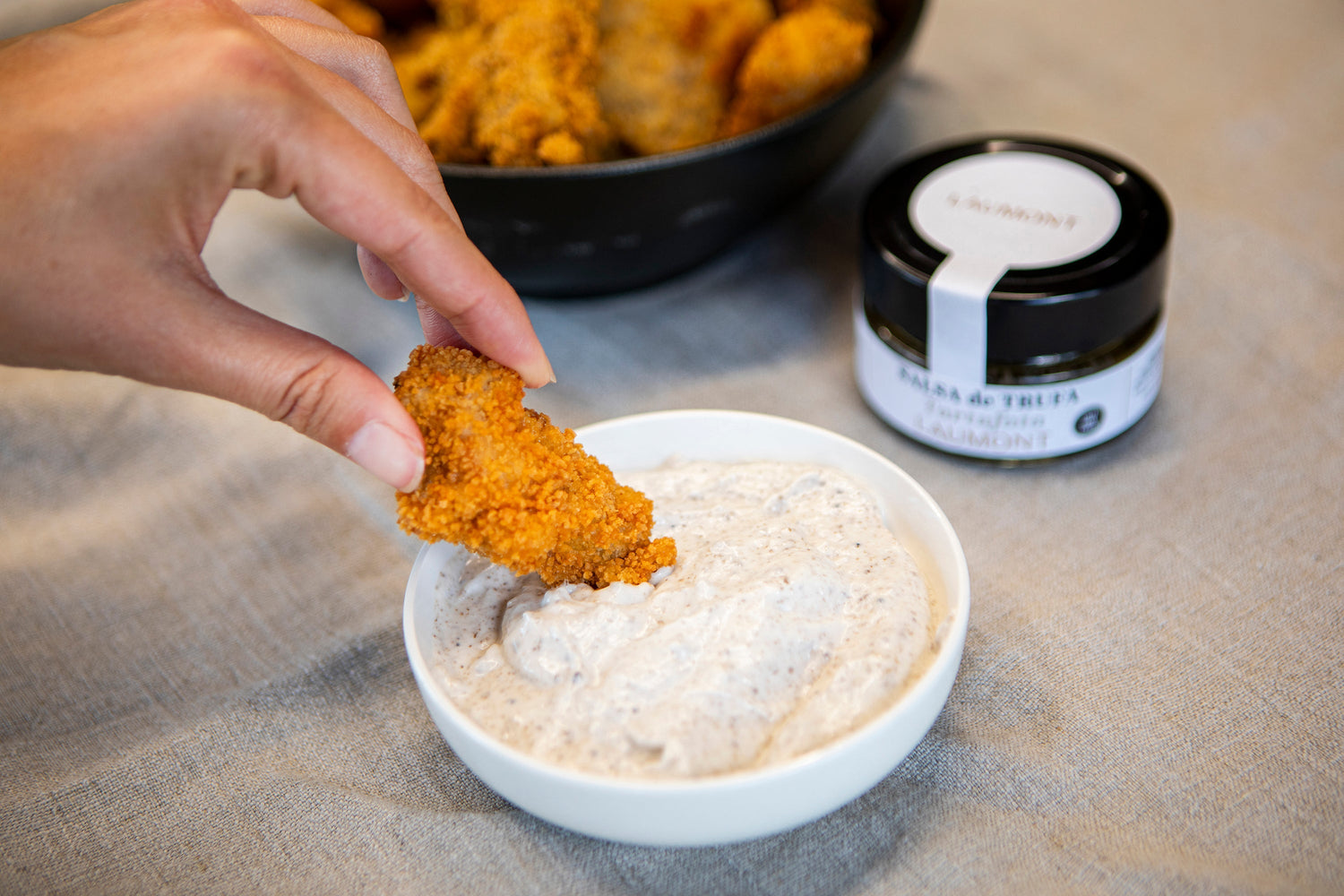 Chicken fingers with tartufata sauce