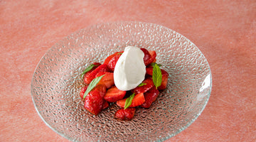Strawberries with truffled vinegar and whipped cream